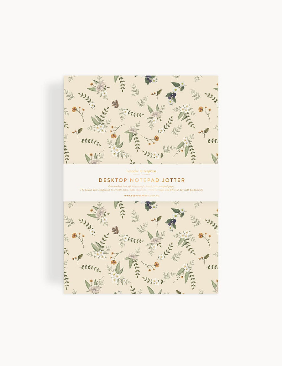 Floral patterned notepad with 'Desktop Notepad' text on a white background