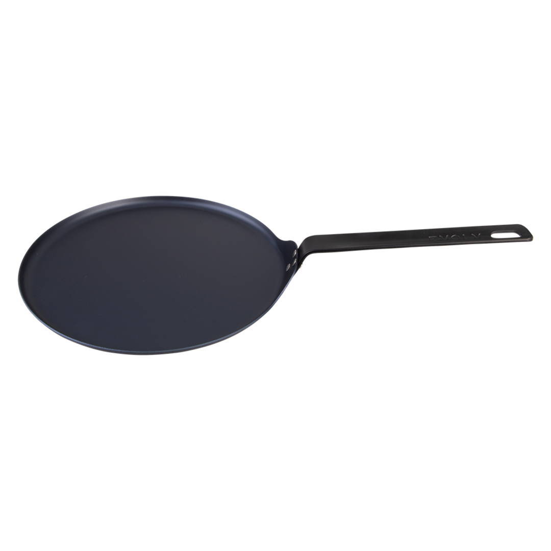 Black carbon steel pancake pan on a white background