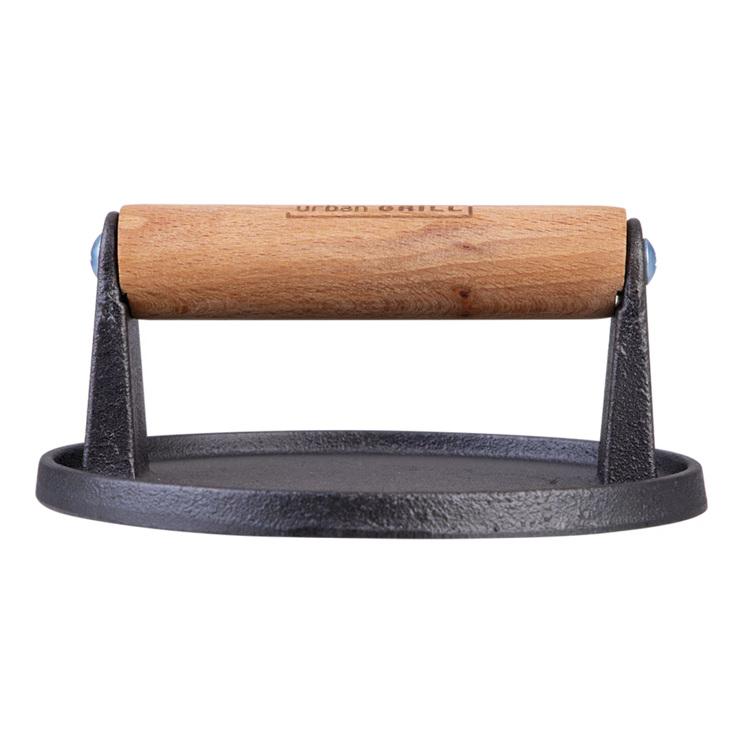 Wooden handle, cast iron burger press on a white background