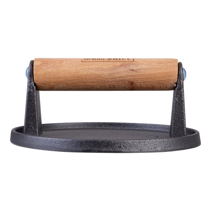 Wooden handle, cast iron burger press on a white background