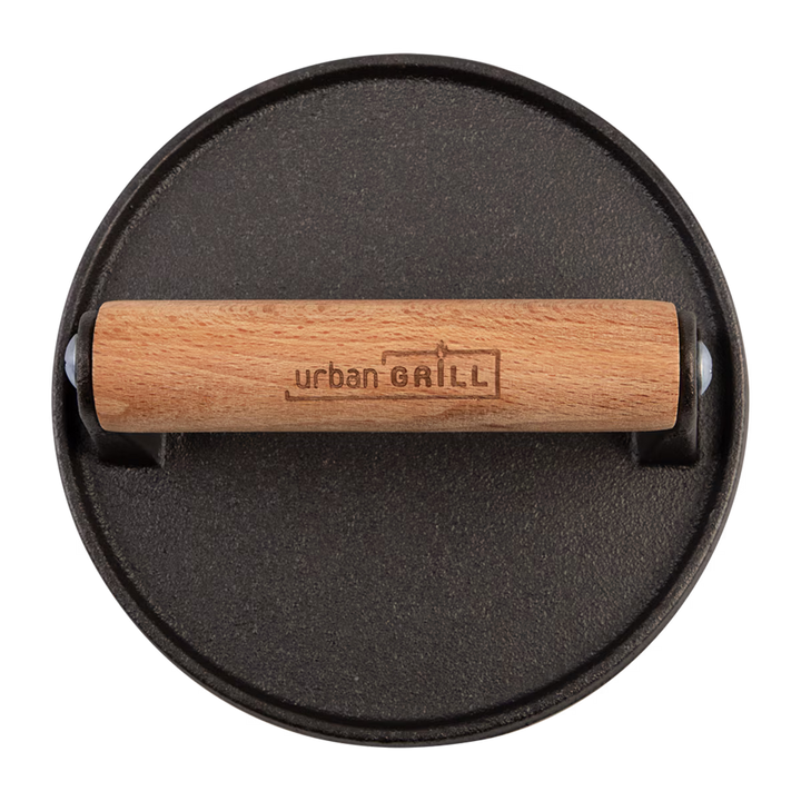 Black cat iron burger press with wooden handle featuring &