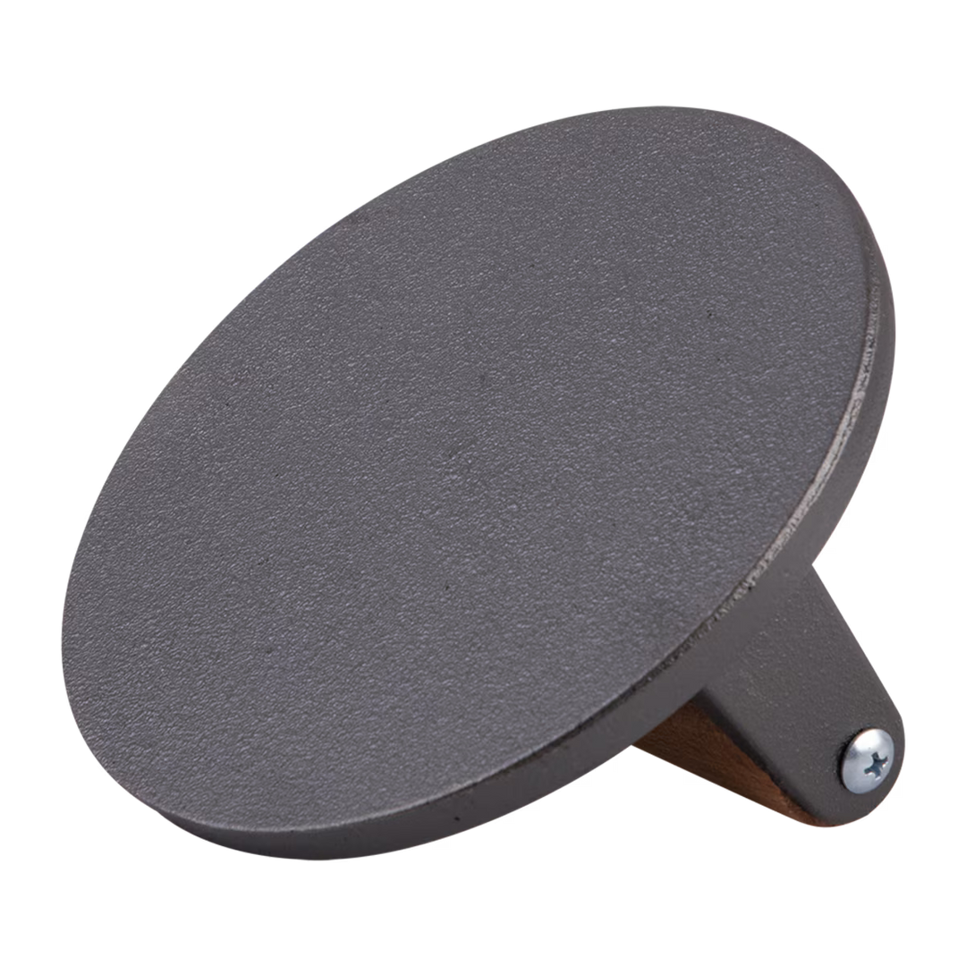 Cast iron burger press on a white background
