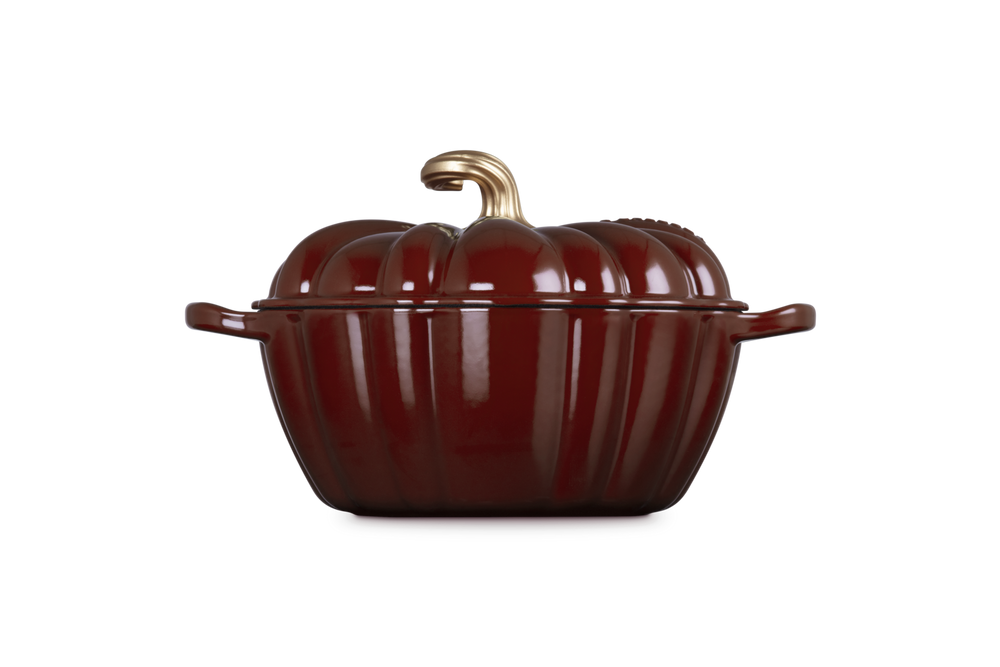 Brown pumpkin-shaped cookware on a white background