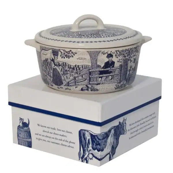 Ceramic cheese baker with blue and white design on a matching box
