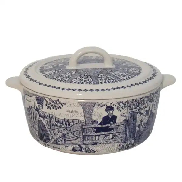 Ceramic cheese baker with blue and white pattern on a white background