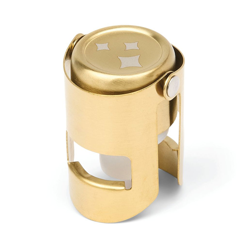 Gold-colored bottle opener with a white background