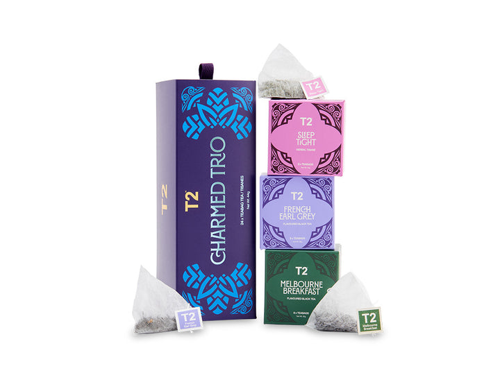 T2 tea packaging including a box and bags on a white background