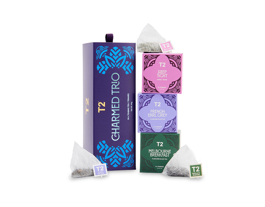 T2 tea packaging including a box and bags on a white background