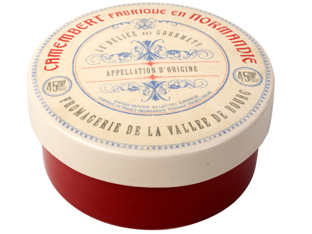 Camembert cheese baker with a decorative red and white label on a white background