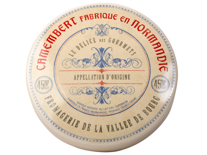 Camembert cheese baker with decorative label on a white background
