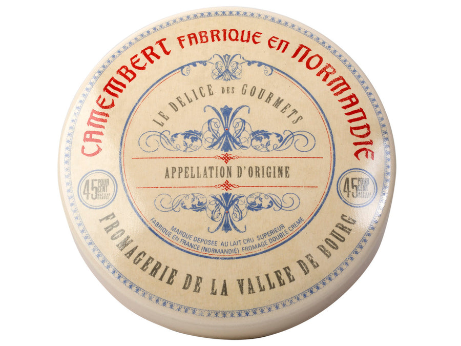 Camembert cheese baker with decorative label on a white background