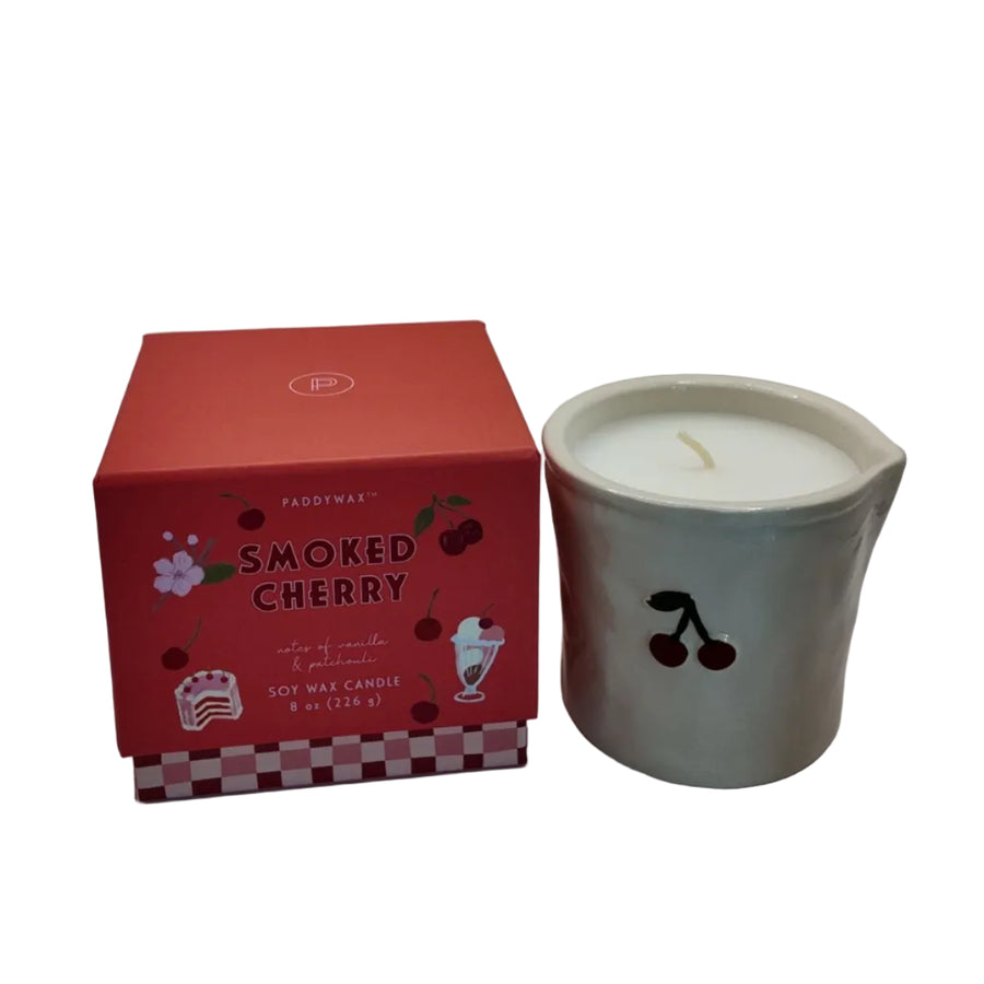 Smoked cherry candle and packaging on a white background