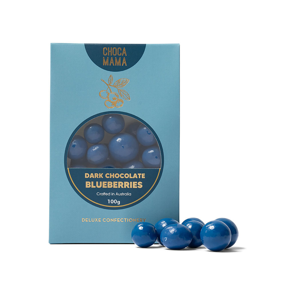 Box of Choco Mama dark chocolate blueberries with blue chocolate pieces on a white background