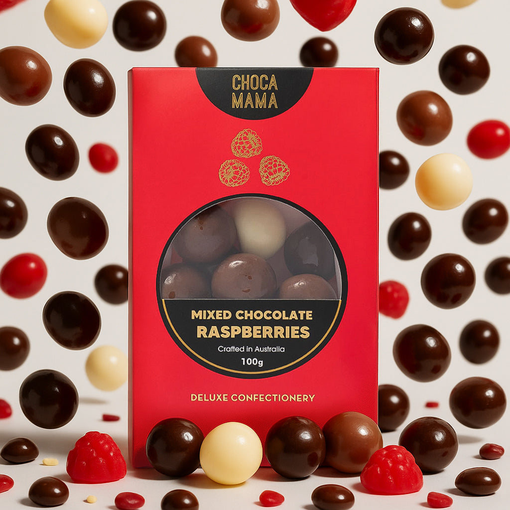 Red box of Choca Mama mixed chocolate raspberries surrounded by assorted chocolates on a light background