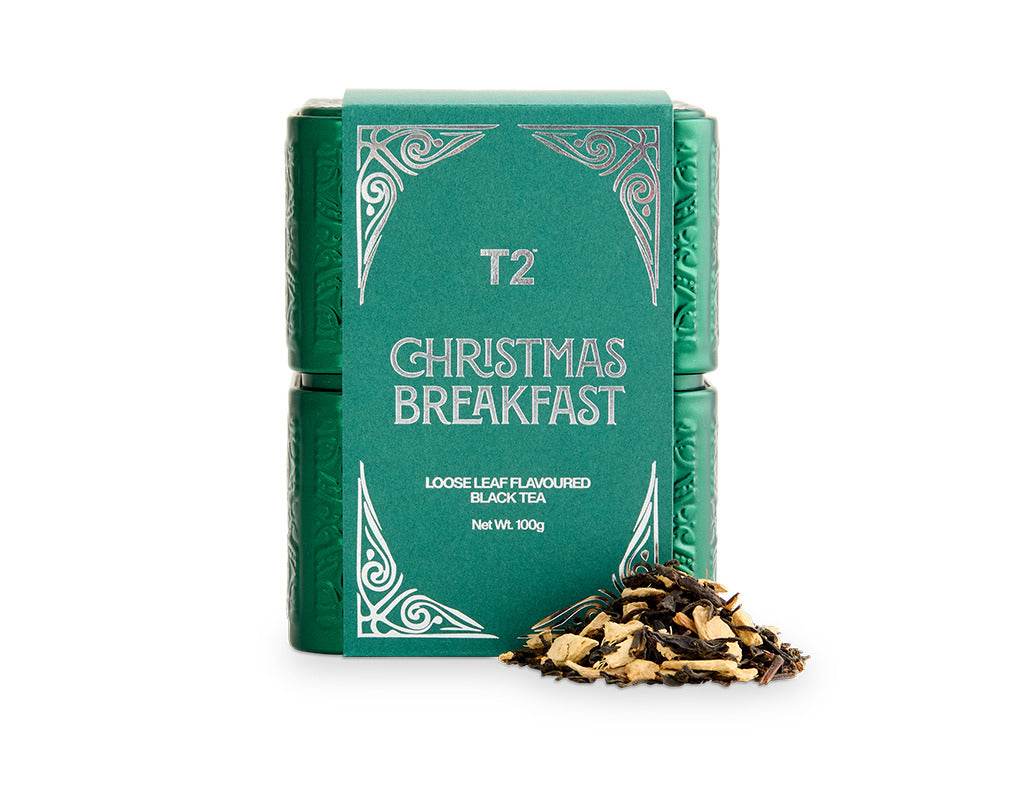 T2 Christmas Breakfast tea packaging with loose leaf tea on a white background