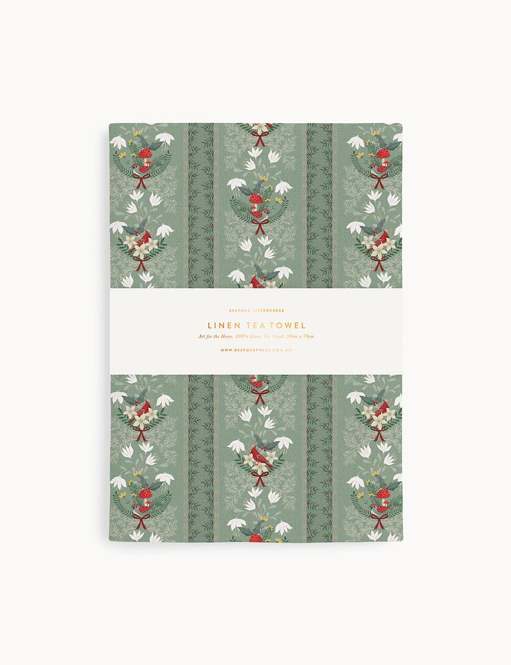 Christmas linen tea towel on a white background