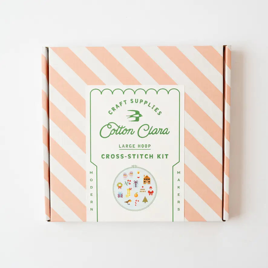 Cotton Clara cross-stitch kit box with striped design on a white background
