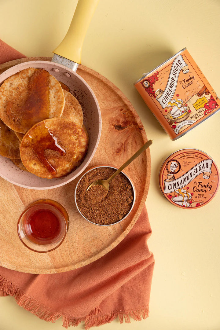 Cinnamon sugar treats with a box of cinnamon sugar on a yellow background