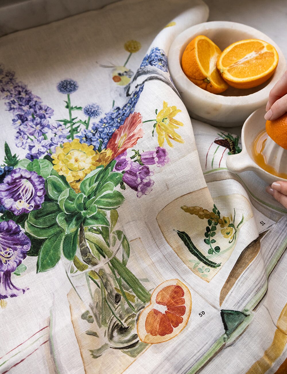 Linen tea towel with flowers a cockatiel on it 