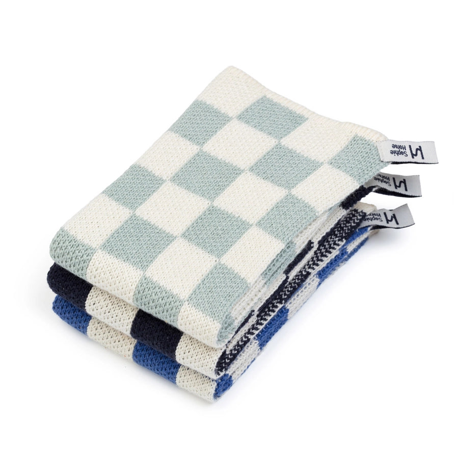 Stack of cotton dishcloths on a white background