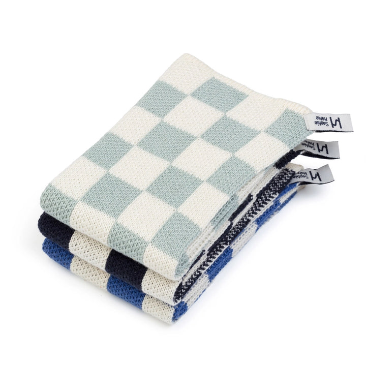 Stack of cotton dishcloths on a white background