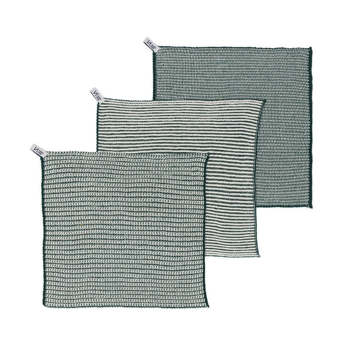 Set of three textured dish cloths with different patterns on a white background