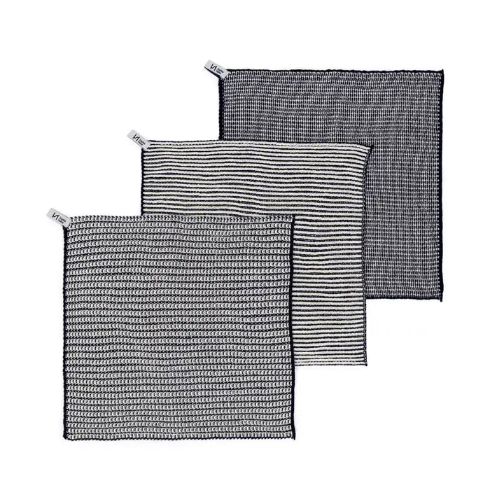 Set of three cotton dish cloths with different patterns on a white background