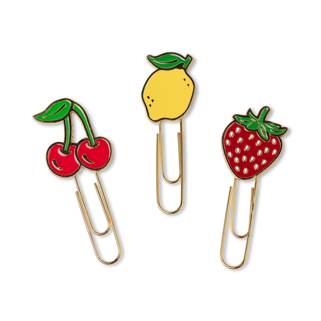 Three paperclips with fruit designs on a white background