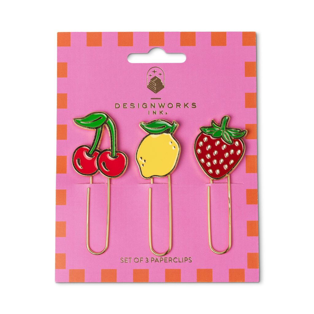 Set of three paperclips shaped like cherries, a lemon, and a strawberry on pink packaging with orange stripes.