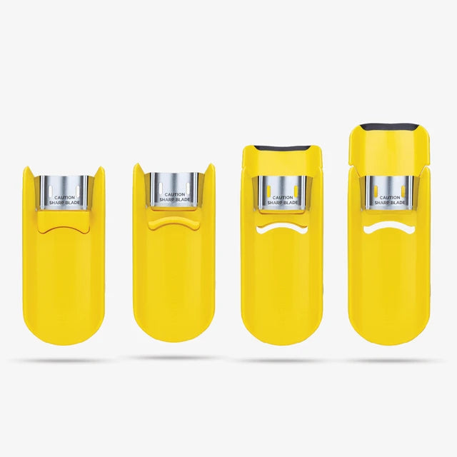 Four yellow corn peelers with metallic tops on a white background