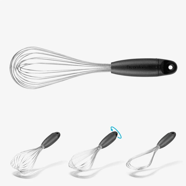 Black-handled whisk a white background