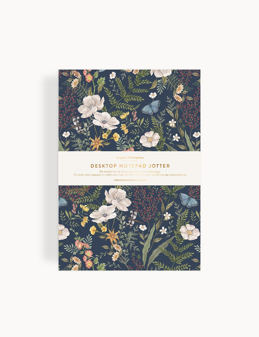 Floral patterned notebook with 'Desktop Notepad Lotter' text on a white background