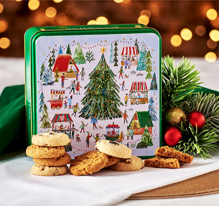 An embossed Christmas tin with biscuits