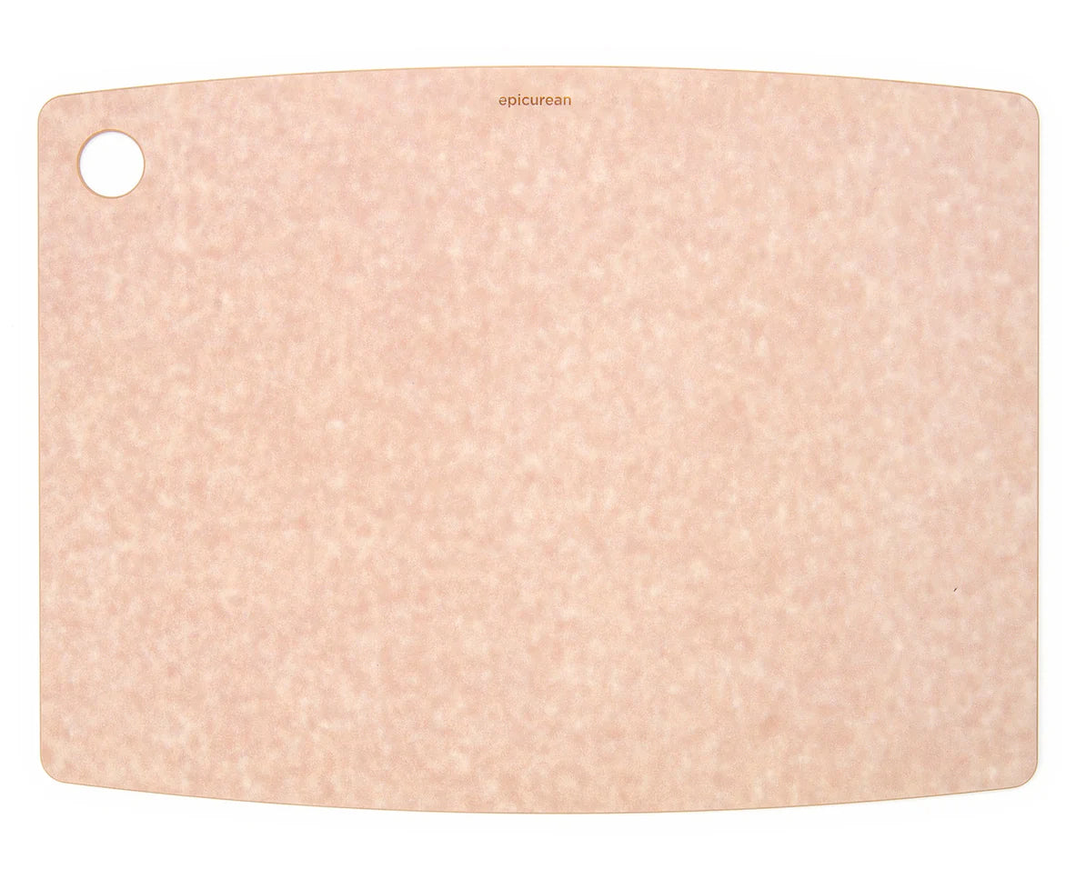 Compressed wood cutting board with a textured surface on a white background
