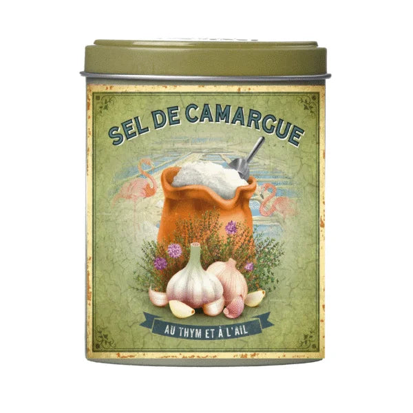 Vintage-style tin canister labeled 'Sel de Camargue' with a design of a bag of salt, garlic, and herbs on a green background.