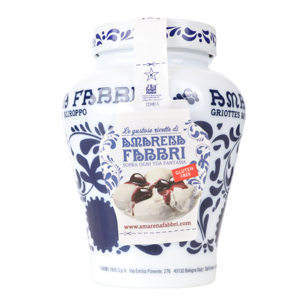 White container with blue decorative patterns of Amarena Cherries and branding on a white background