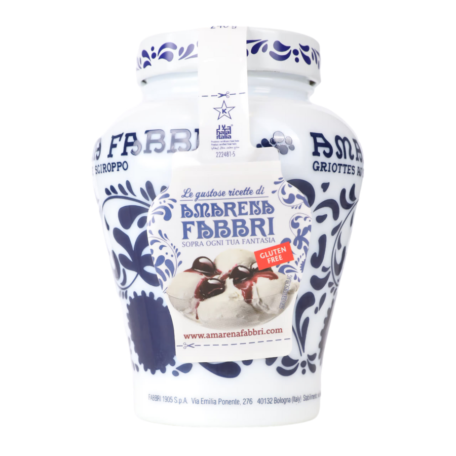 White container with blue decorative patterns of Amarena Cherries and branding on a white background