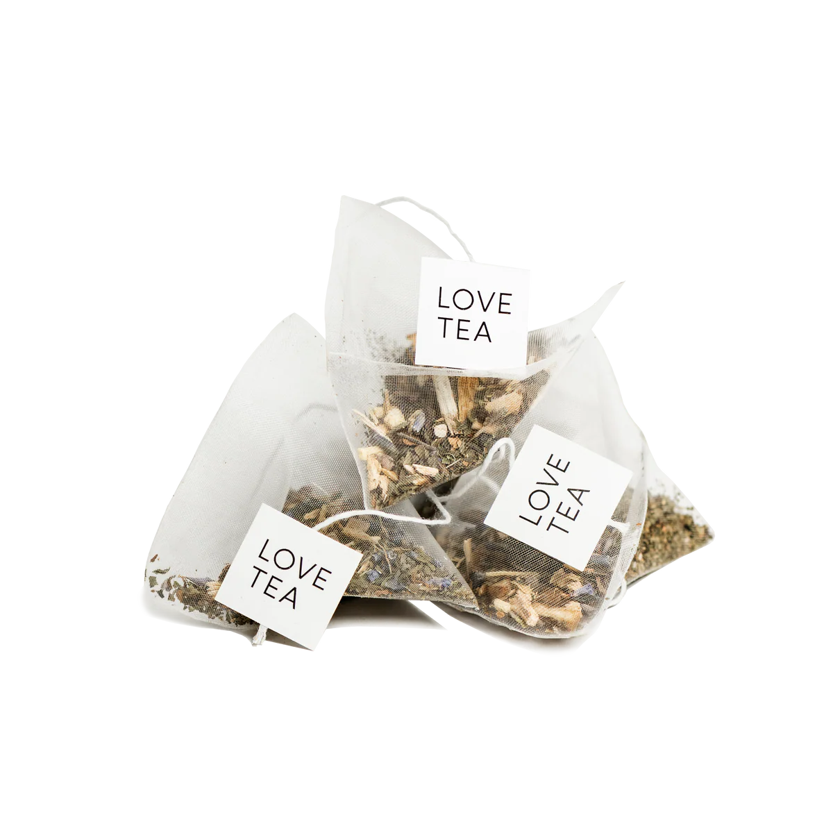 Tea bags with 'LOVE TEA' labels on a white background
