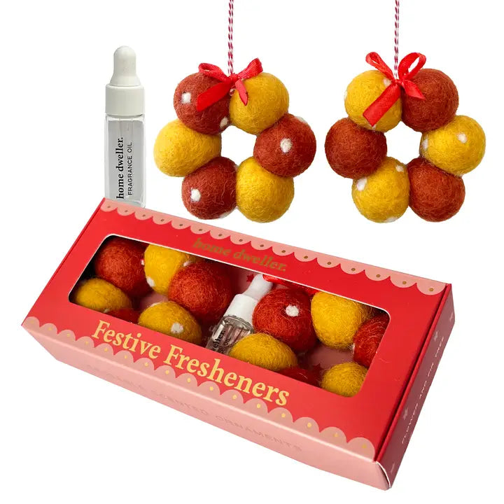 Festive freshener set with red, yellow, and brown balls in a box with a diffuser.