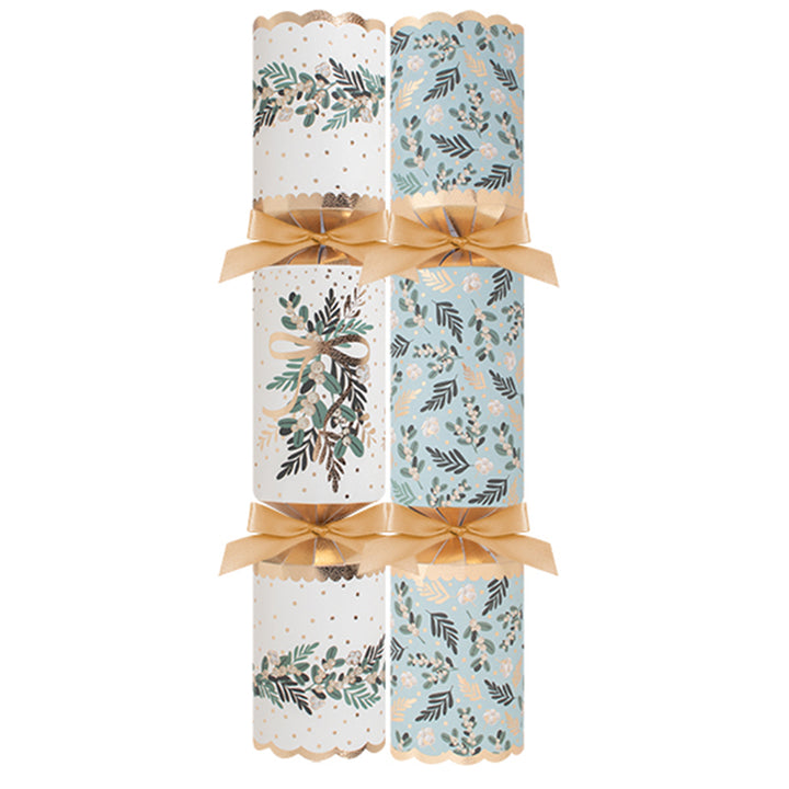 Christmas crackers with gold ribbon on white background