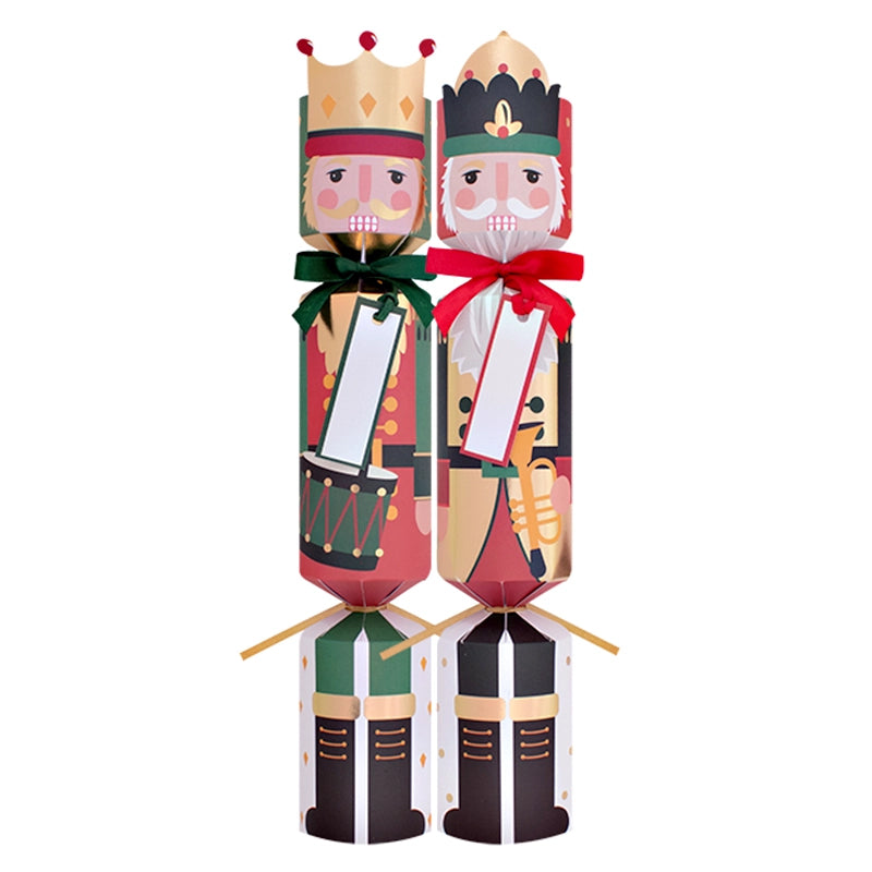 Two Christmas nutcrackers with colorful outfits on a white background