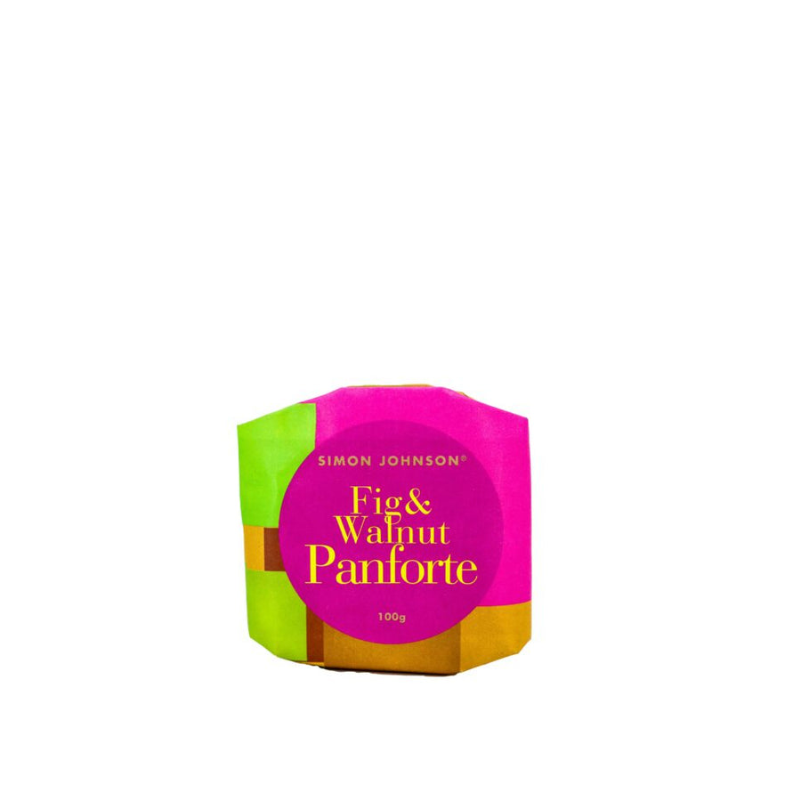 Brightly coloured wrapped Simon Johnson Fig & Walnut Panforte on a white background