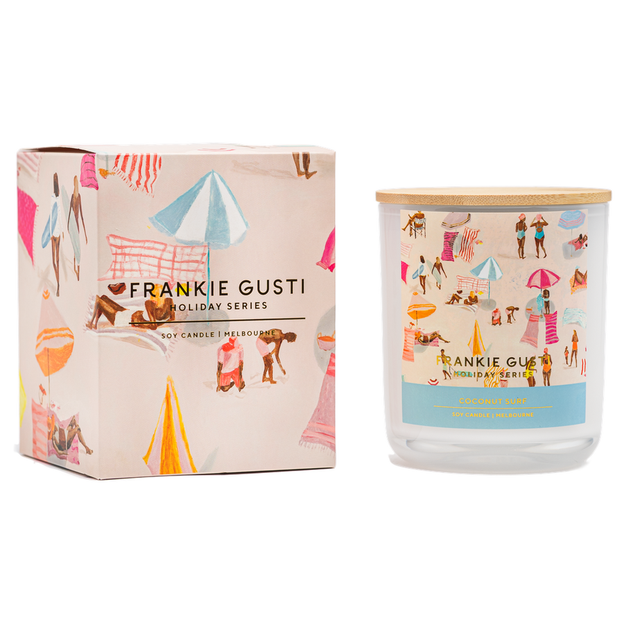 Frankie Gusti holiday series candle and packaging on a white background