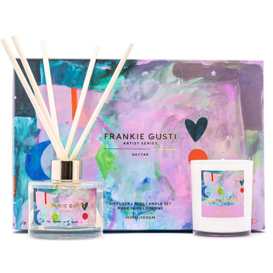 Diffuser and mini candle set by Frankie Gusti with colorful packaging on a white background