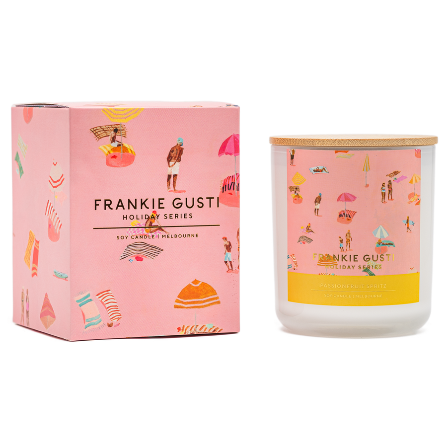 Frankie Gusti candle and packaging with beach-themed illustrations on a white background