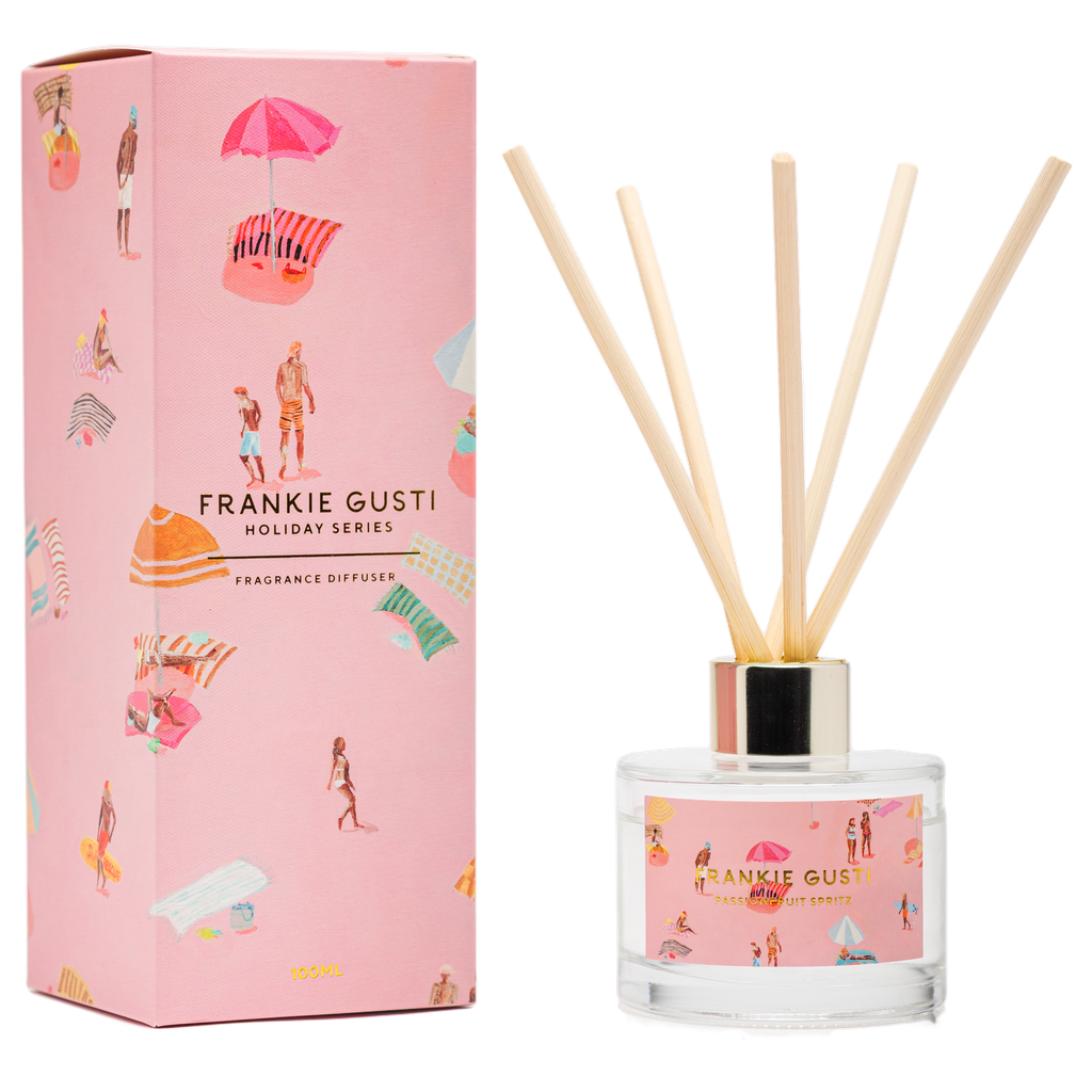 Frankie Gusti fragrance diffuser with pink packaging featuring beach-themed illustrations.