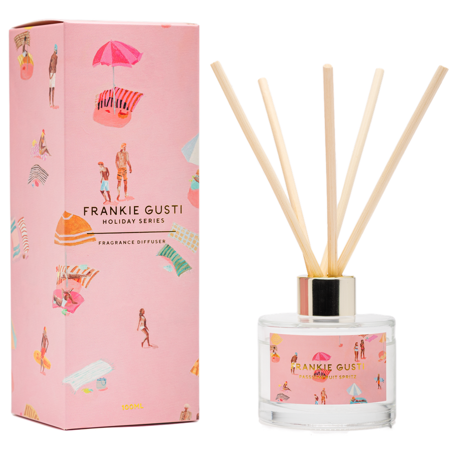 Frankie Gusti fragrance diffuser with pink packaging featuring beach-themed illustrations.