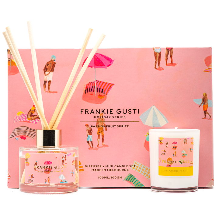 Diffuser and mini candle set by Frankie Gusti with a pink beach-themed box in the background.