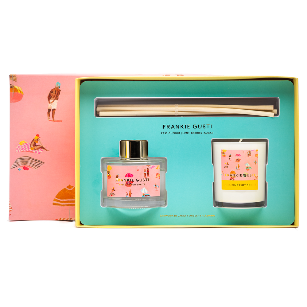 Frankie Gusti diffuser and candle set in a gift box with a pink and yellow design.