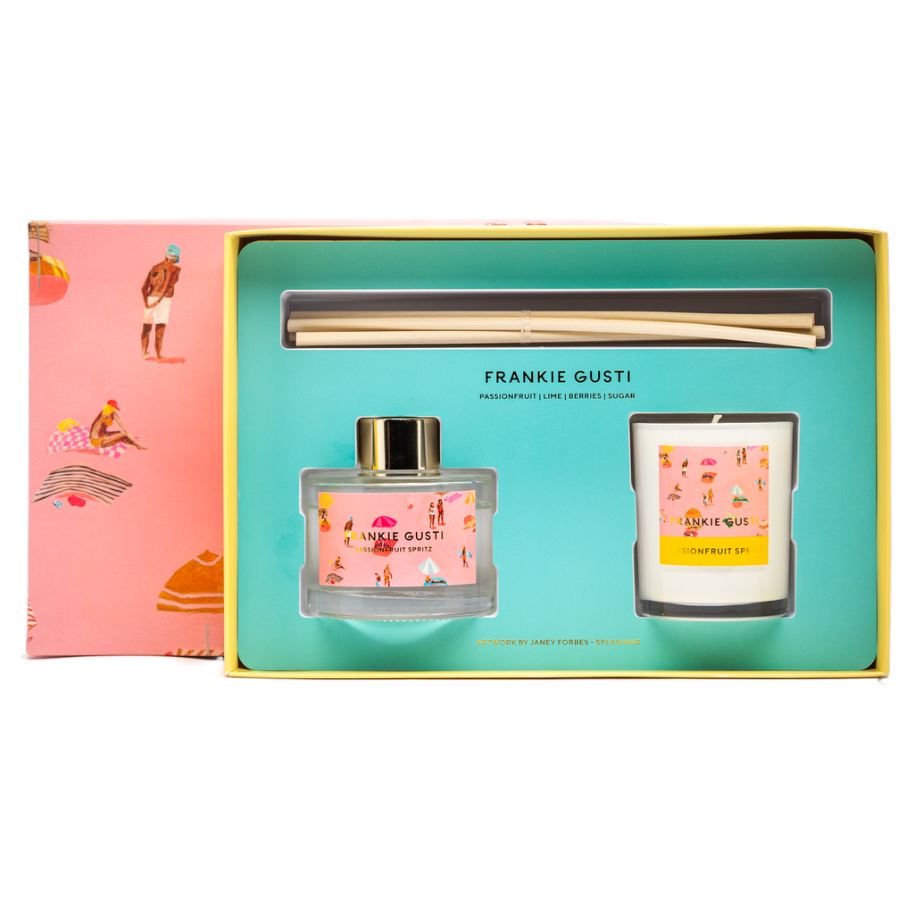 Frankie Gusti diffuser and candle set in a gift box with a pink and yellow design.